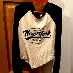 White and Black New York cropped full sleeve. Size medium. BRAND NEW